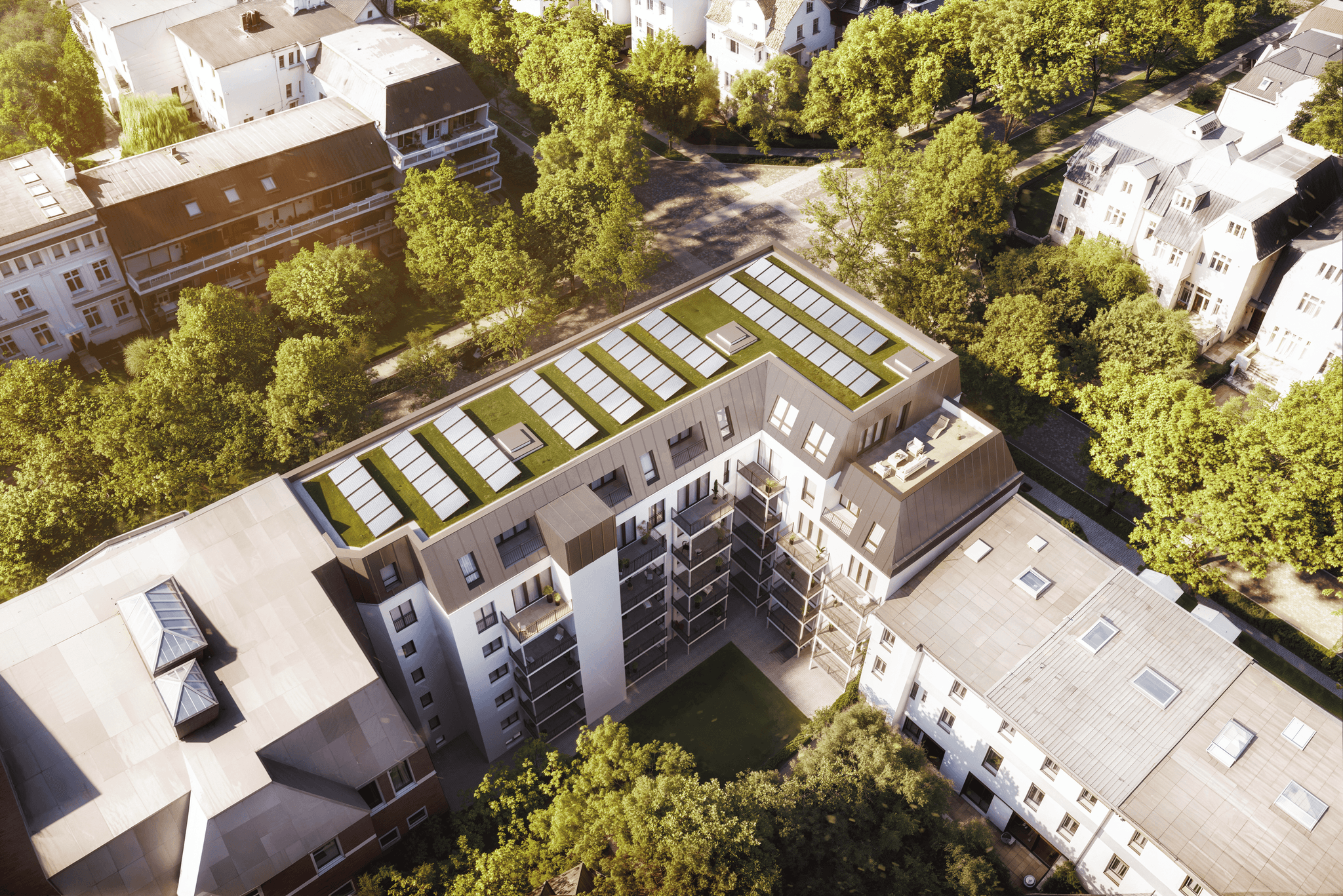 Daytime view of the Parkallee building with large windows and elegant architecture that reflects the environment. Daytime view of the Parkallee building with large windows and elegant architecture that reflects the environment.