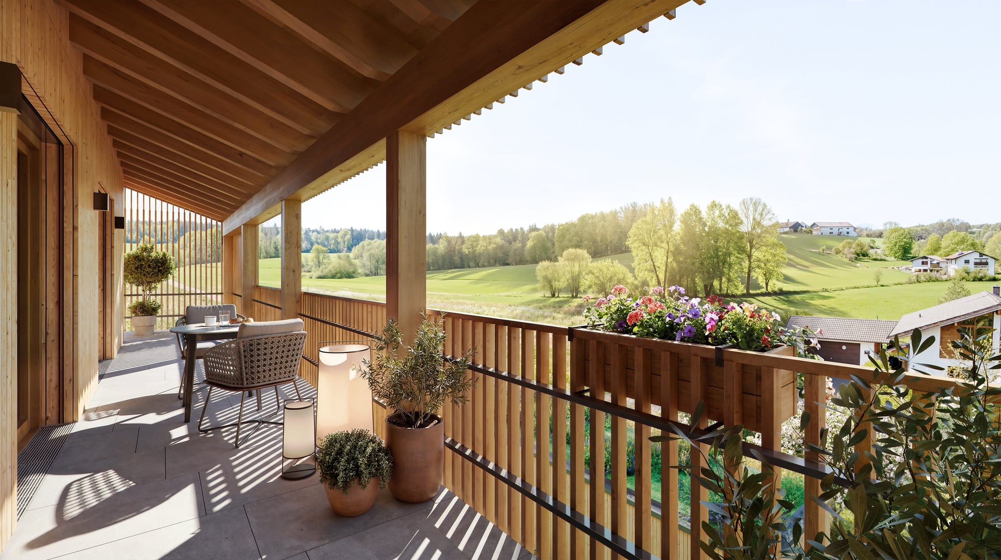 Überdachter Balkon im Zenznhof mit Blick ins Grüne Überdachter Balkon im Zenznhof mit Blick ins Grüne